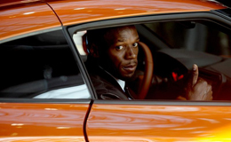 博尔特现身纽约车展 现场互动与粉丝合影